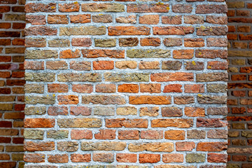 Medieval bricks wall, brick structure background or wallpaper