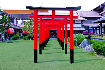 Row of red torii at J Park,Chonburi, Thailand.