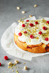Cinnabon buns. Sinabon rolls with cream cheese, cream and brown sugar. Cinnamon rolls with raspberries and pistachios