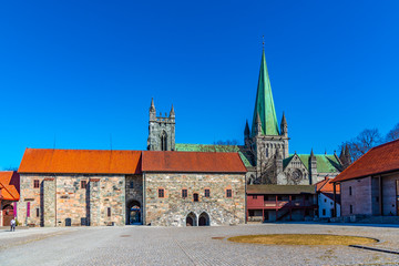 Nidaros cathedral viewed from courtyard of archbishop's palace in Trondheim, Norway