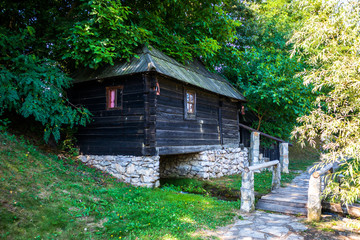 Old vintage wooden water mill