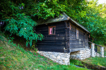 Old vintage wooden water mill