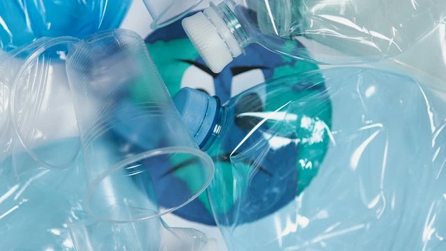 Plastic bottle discarding on earth planet picture, environment pollution concept