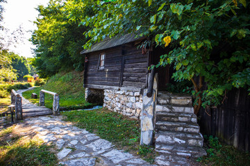 Old vintage wooden water mill