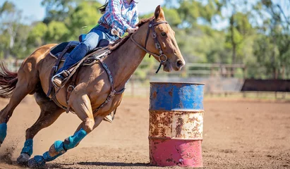 Fototapete Pferdesport Horse And Rider Competing In Barrel Race At Outback Country Rodeo  © Jackson Photography