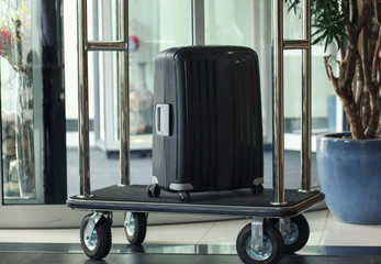 Hotel luggage cart trolley and suitcase