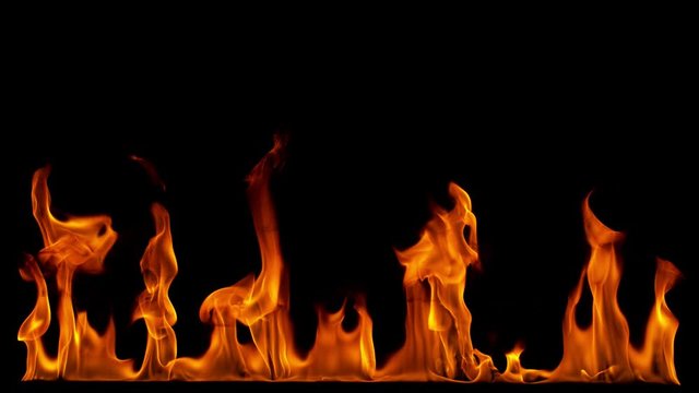 Super slow motion of fire line isolated on black background. Filmed on high speed cinema camera, 1000 fps