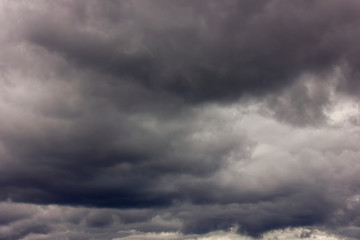 Dark rain clouds before a thunderstorm. Background of storm clouds before a thunder-storm.
