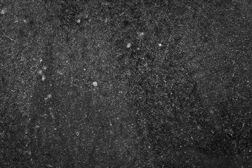 white dust and scratches on a black background. The texture of dirt on the glass.