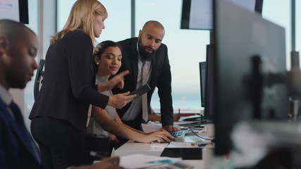 business woman team leader meeting with colleagues using computer pointing at screen office manager sharing ideas helping coworkers discussing strategy in corporate workplace