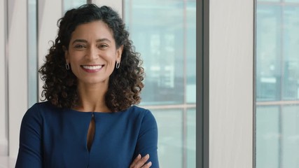 portrait confident business woman smiling with arms crossed successful female office executive enjoying career in corporate leadership company manager at work - Powered by Adobe