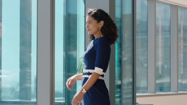 independent business woman looking out window proud ceo planning ahead thinking of ideas for future investment strategy corporate manager enjoying leadership career in office