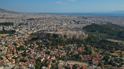 Aerial drone photo of iconic Plaka and Monastiraki districts and iconic Acropolis hill with masterpiece of Western Ancient world the Parthenon, Athens historic centre, Attica, Greece