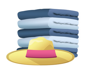 Summer hat and and towels piled up