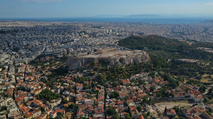 Aerial drone photo of iconic Plaka and Monastiraki districts and iconic Acropolis hill with masterpiece of Western Ancient world the Parthenon, Athens historic centre, Attica, Greece