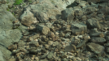 Rocky abstract background. stones in the dry course
