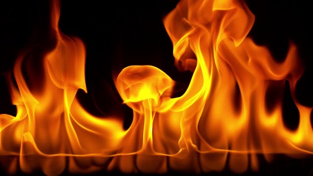Super slow motion of flames isolated on black background in detail. Filmed on high speed cinema camera, 1000 fps