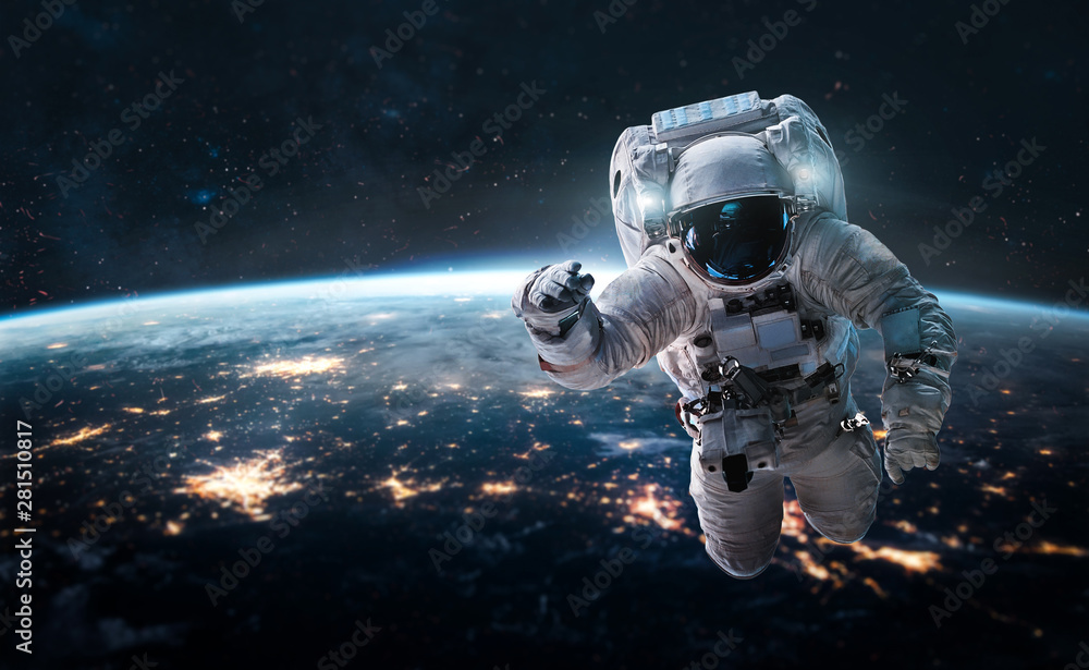 Aufkleber astronaut in the outer space over the nightly planet earth. city lights. abstract wallpaper. spacema