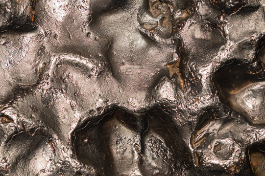 Meteorite texture background. meteorite surface close up