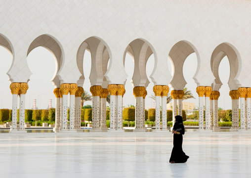 Woman walking in mosque