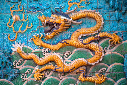 Close up of traditional Chinese dragon on tiles