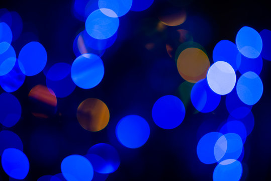 Close up of nice multicoloured colorful bubles of christmas tree in dark light background, New Year, christmas mood