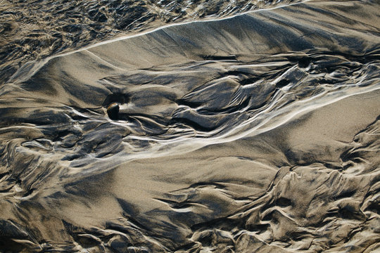 View of beach sand and patterns at low tide, Arcadia Beach State park, Oregon, USA