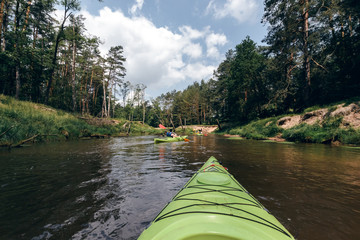 Fototapeta premium A people kayaking down the river.