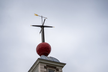 A time ball with weathervane sits atop the Octagon Room of Flamstead House at the Royal Observatory Greenwich, London England UK