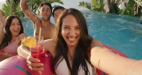 beautiful woman taking video using smartphone in swimming pool sharing fun summer vacation with friends at luxury hotel resort on social media enjoying travel holiday 4k - Powered by Adobe