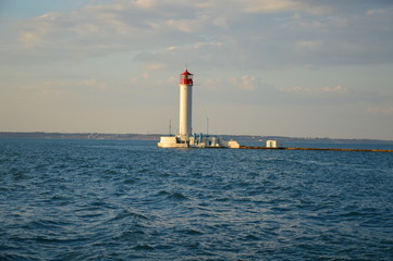 Lighthouse postcard view with sea on the background