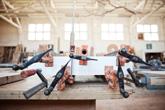 Clamps on workbench in workshop