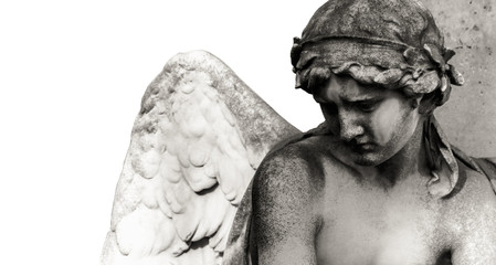 Sad guardian angel sculpture with open wings isolated on white wide background. Sad expression...