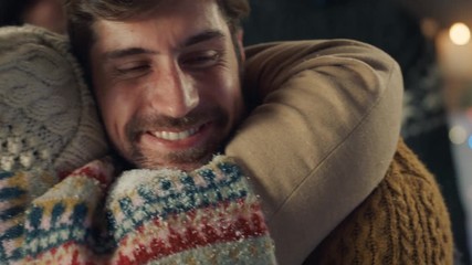 african american grandparents visiting for christmas young man hugging grandmother enjoying festive holiday celebration on winter evening at home 4k footage - Powered by Adobe