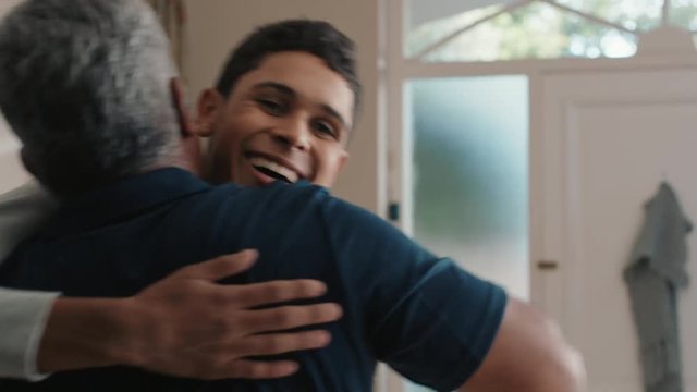 Happy Teenage Boy Hugging Father Congratulating Son Successful Achievement Excited Dad Feeling Proud Parent At Home 4k