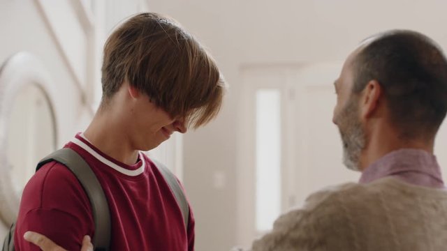 teenage boy hugging father congratulating son successful achievement excited dad feeling proud parent enjoying family connection 4k