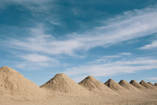 Heap of mining tailings in desert