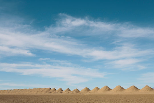 Heap of mining tailings in desert