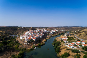 Fototapeta na wymiar Aerial view of the beautiful village of Mértola in Alentejo, Portugal; Concept for travel in Portugal and Portuguese historical villages.