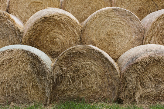 Stack of hay bales in field