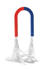Magnet attracting paper clips on white background
