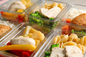 Boxes with prepared meals as background, closeup