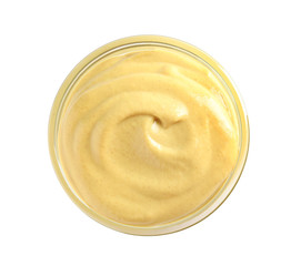 Delicious mustard in bowl on white background, top view. Spicy sauce