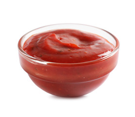 Delicious tomato sauce in bowl on white background