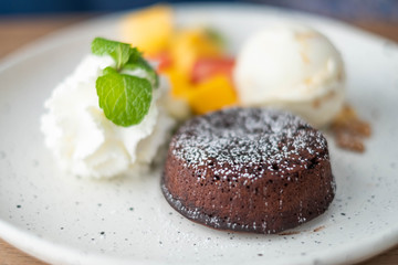 Chocolate Lava Cake with fresh fruits, icecream and whipcream.