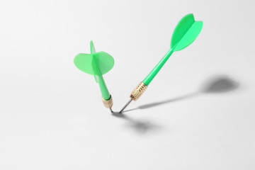 Green dart arrows for game on white background