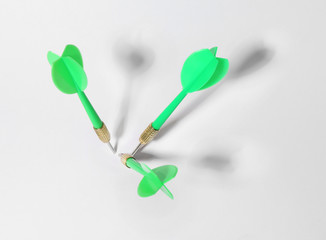 Green dart arrows for game on white background, above view