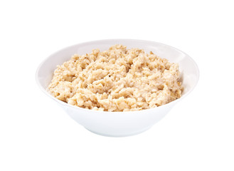 Ceramic bowl with prepared oatmeal  isolated on white background.