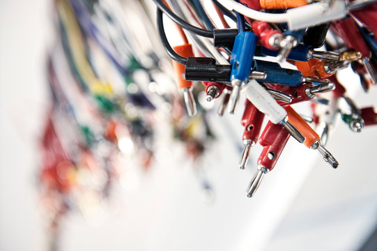 Close up of electrical leads in laboratory