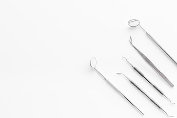 dentist desk with instruments on white background top view mock up